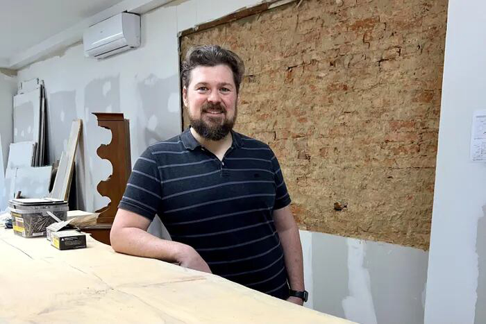 Michael Brenfleck behind what will be the bar at Little Walter's, the restaurant he is building at 2049 E. Hagert St.